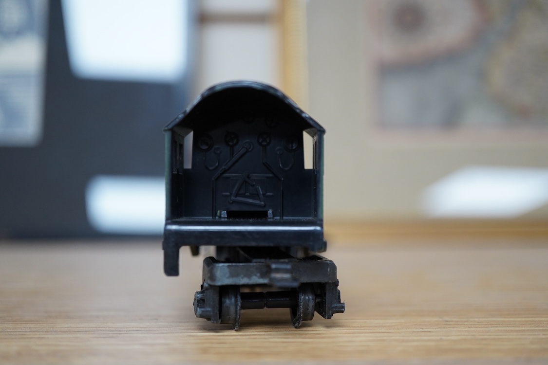 A quantity of 00 gauge model railway by Hornby, Tri-ang, etc. including nineteen locomotives in BR, GWR, LMS, etc. liveries, together with a boxed electrically operated turntable (R070), a terraced house (R8621) and a ga